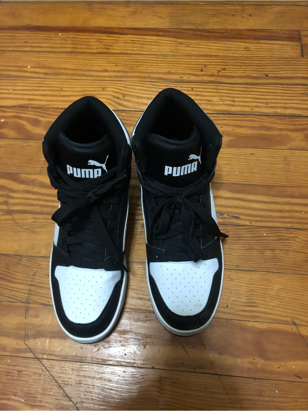 Puma Black and White Mid-Top Sneakers